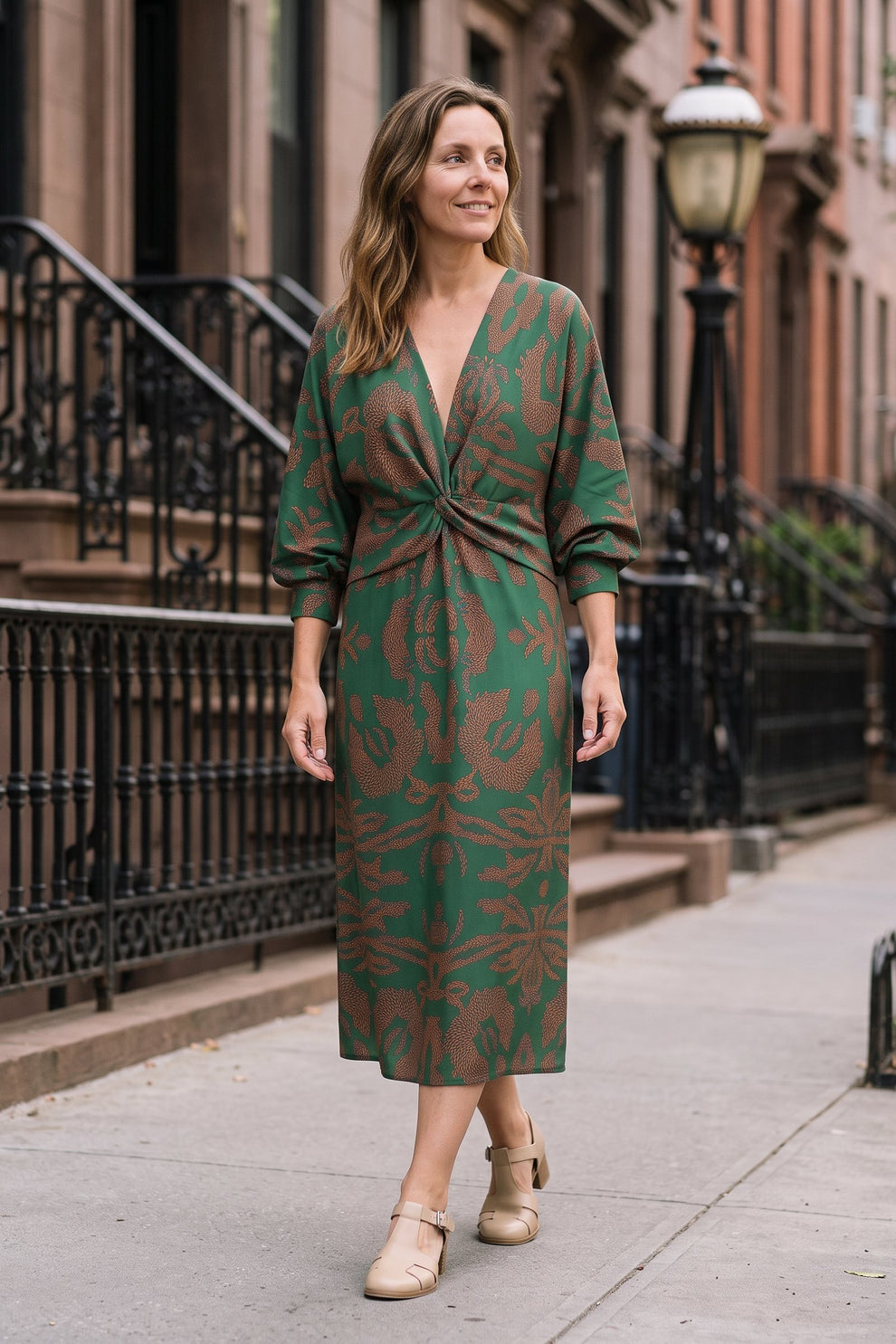 Women's Fall Wedding Guest Dress | Long Sleeve Twist Midi — Green — lifestyle — on model