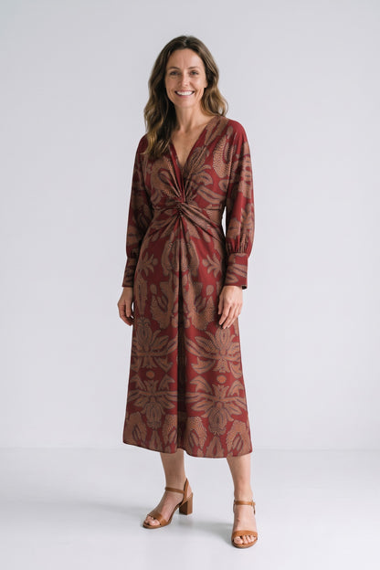 Women's Fall Wedding Guest Dress | Long Sleeve Twist Midi — Red — front view — on model