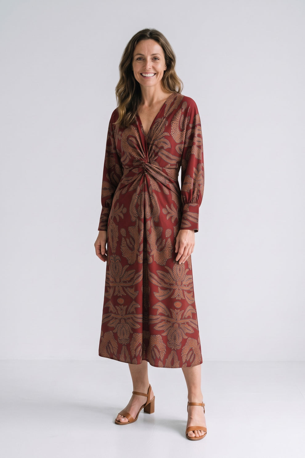 Women's Fall Wedding Guest Dress | Long Sleeve Twist Midi — Red — front view — on model
