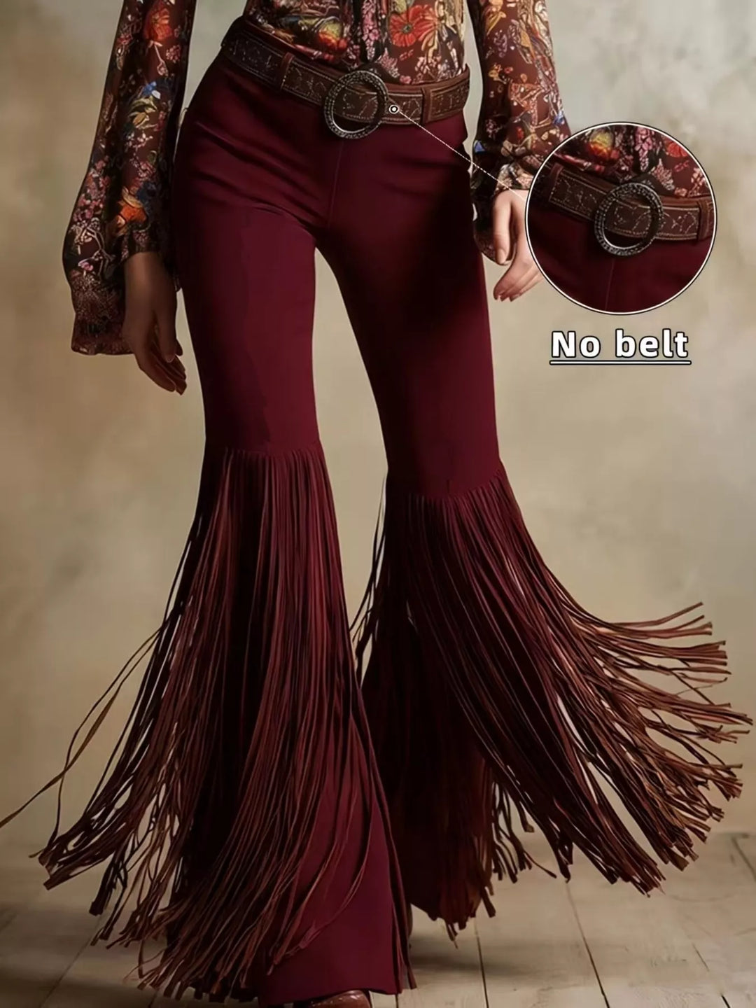 Burgundy high waisted flare pants with fringe hem worn with a printed top