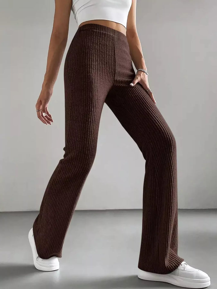 Chocolate brown flare pants side view showing the flared leg