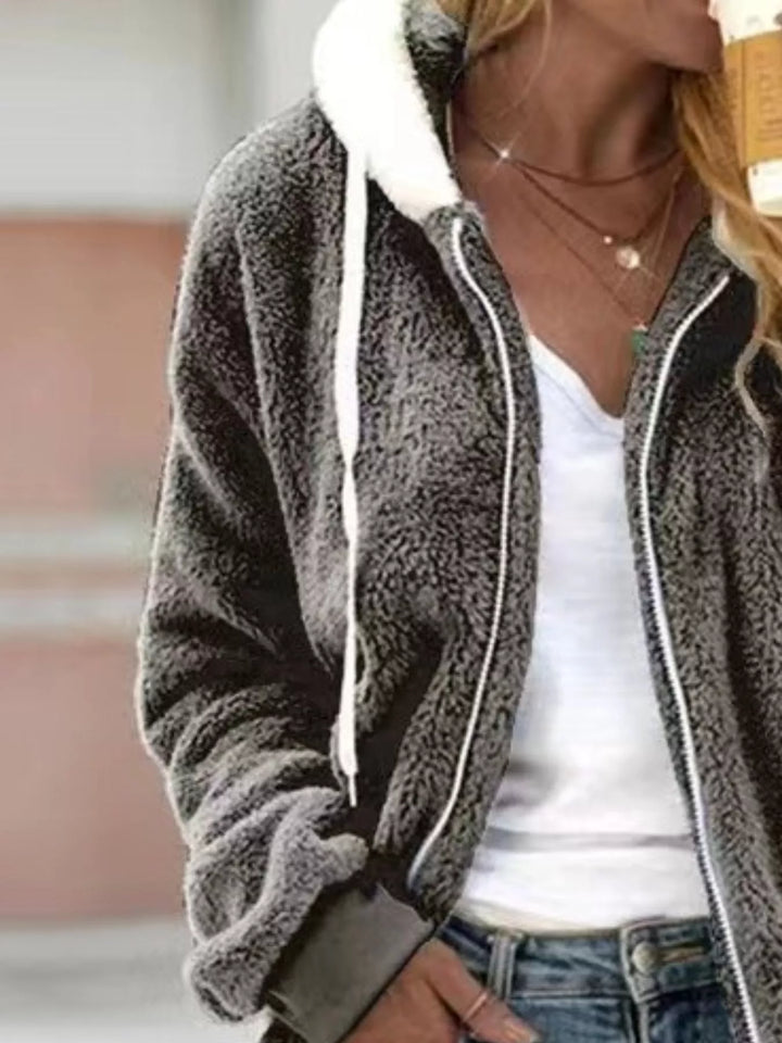 Charcoal fleece jacket with white drawstrings, close view of the hood