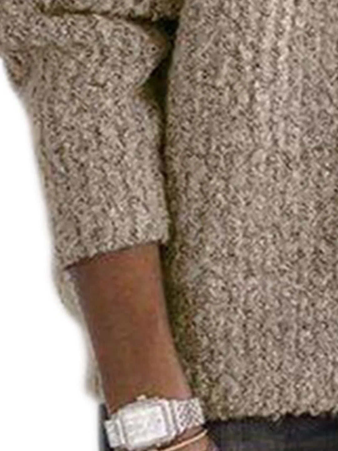 Beige half zip sweater, close-up of the sleeve cuff and knit texture