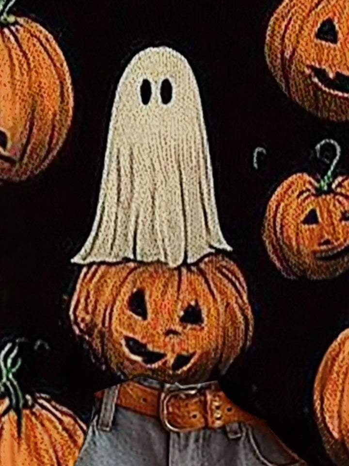 Close-up of black sweater with a ghost on a jack-o-lantern print