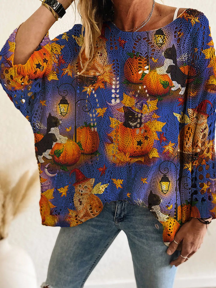 Blue oversized Halloween sweater with pumpkins, black cats and autumn leaves print