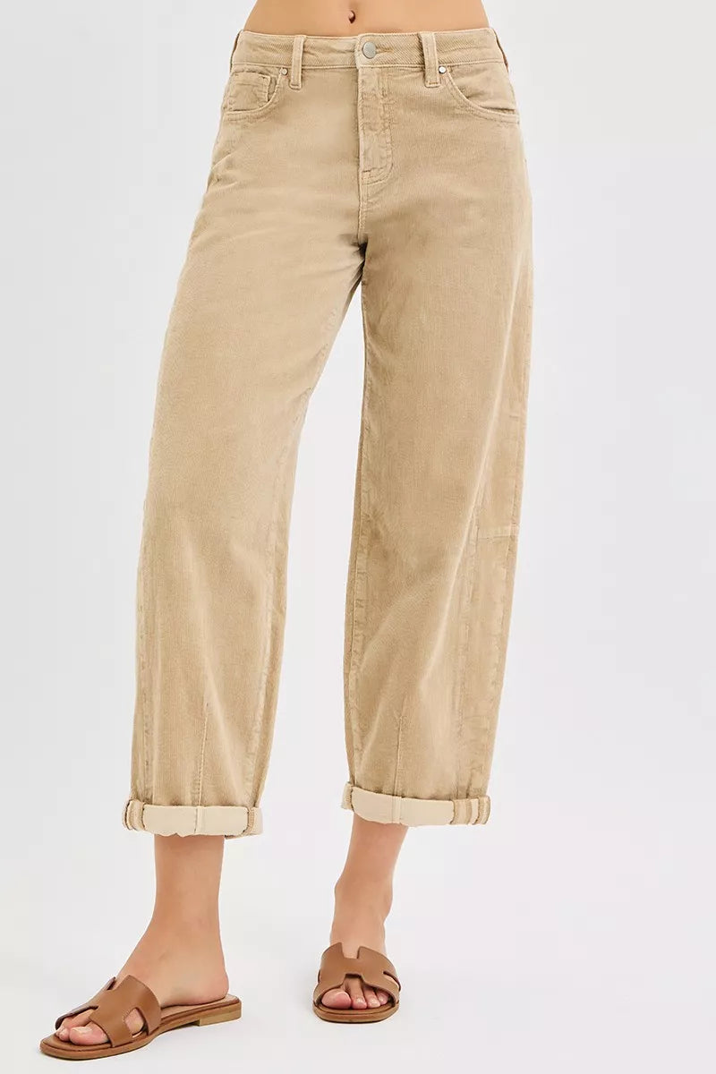 Tan cropped barrel leg pants with cuffed hem, front view with brown sandals