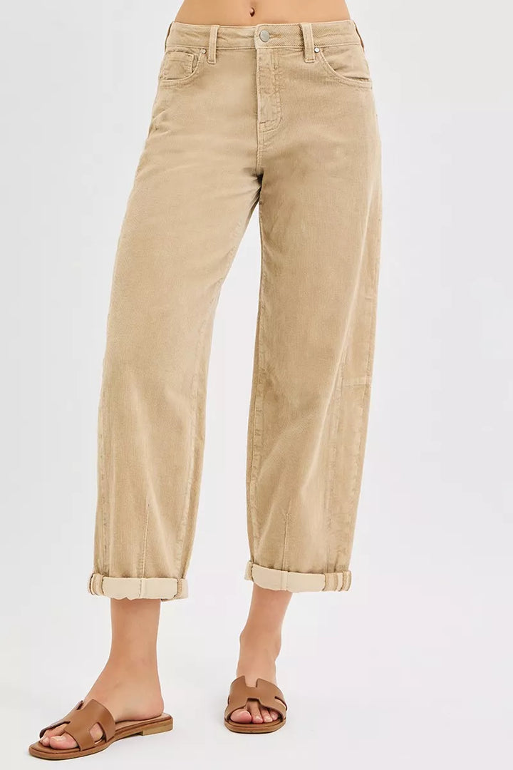 Tan cropped barrel leg pants with cuffed hem, front view with brown sandals