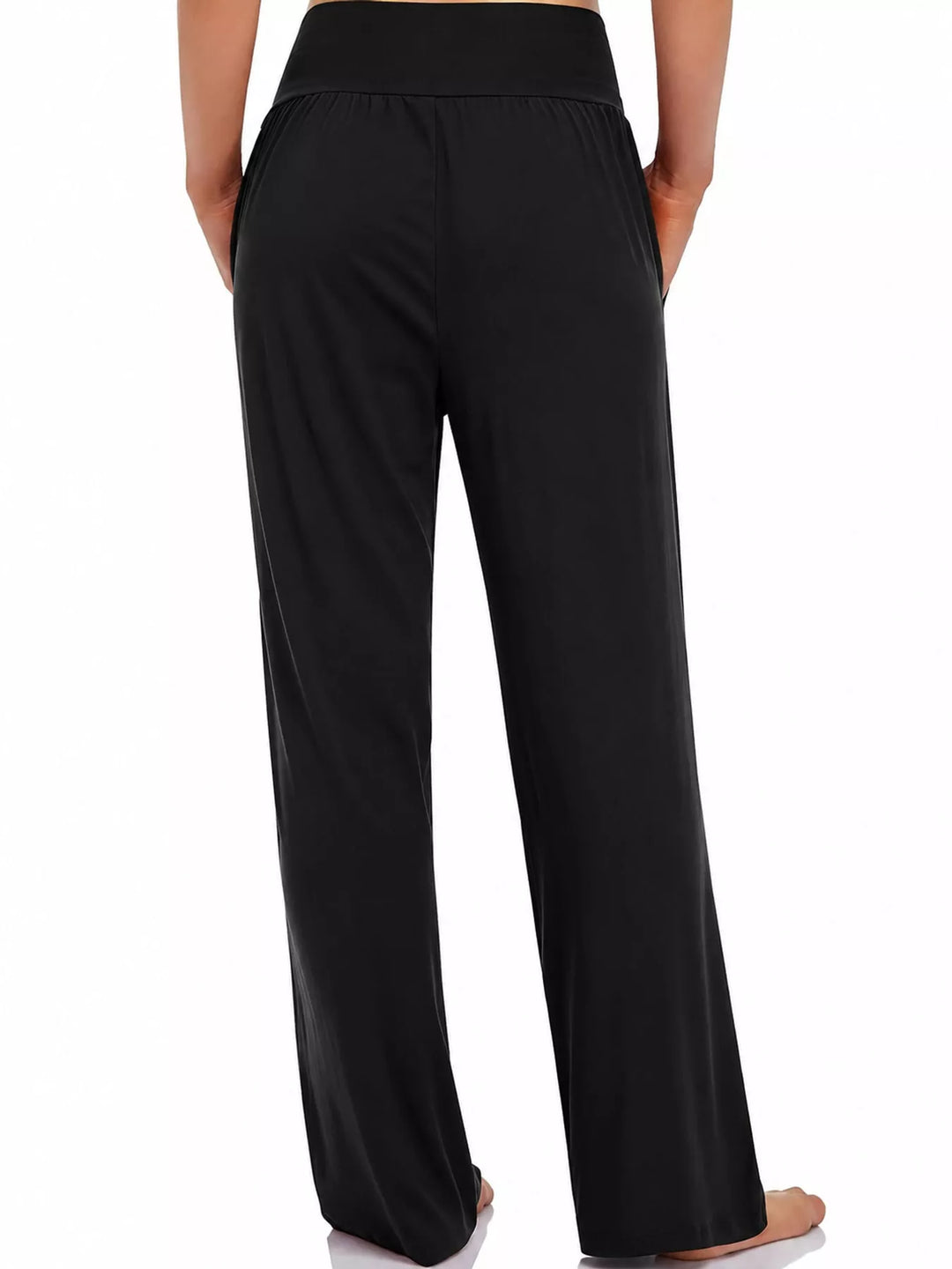 Black high waisted wide leg pants, back view with smocked waistband
