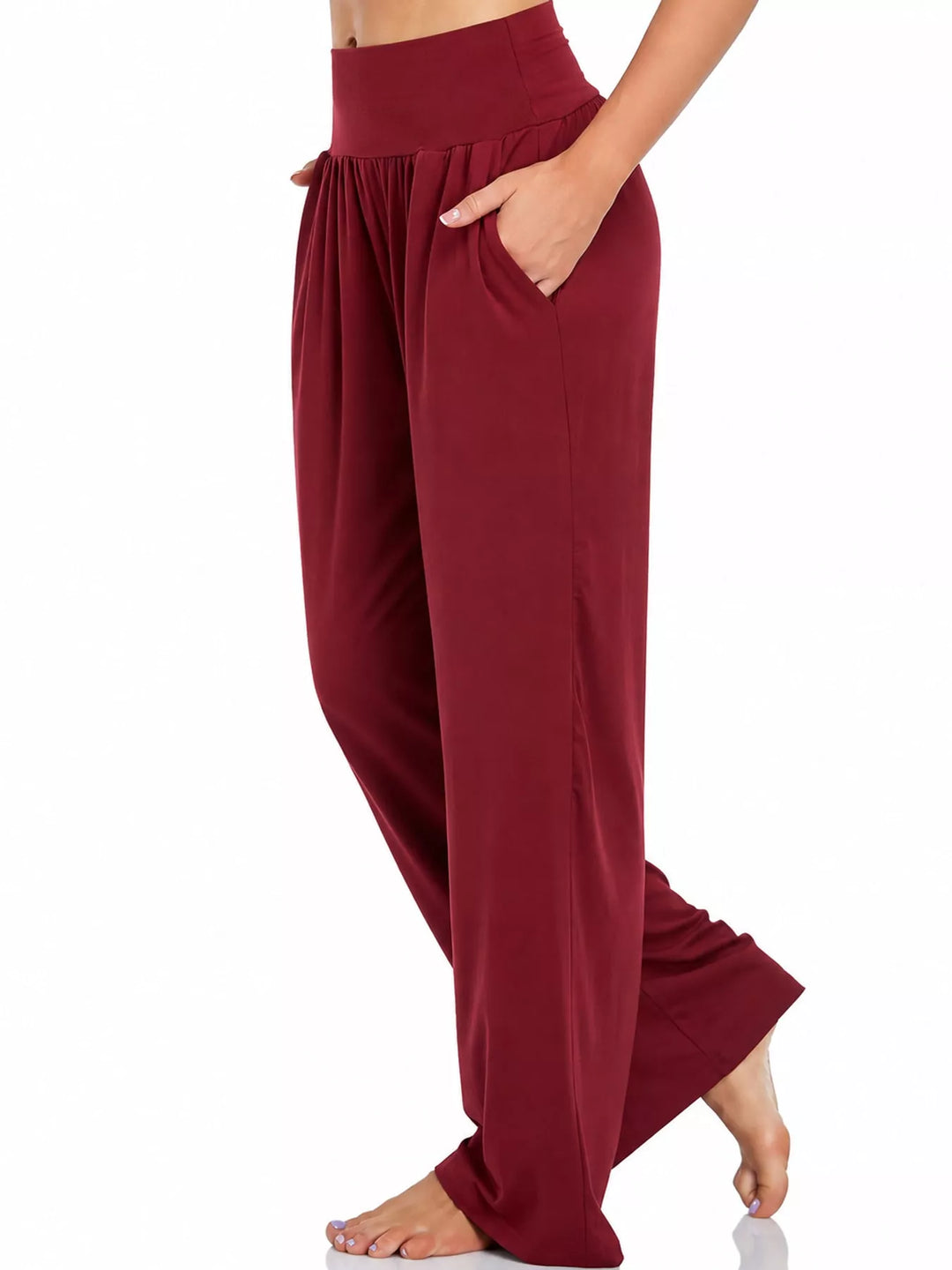 Burgundy high waisted wide leg pants, side view showing the pocket and wide leg