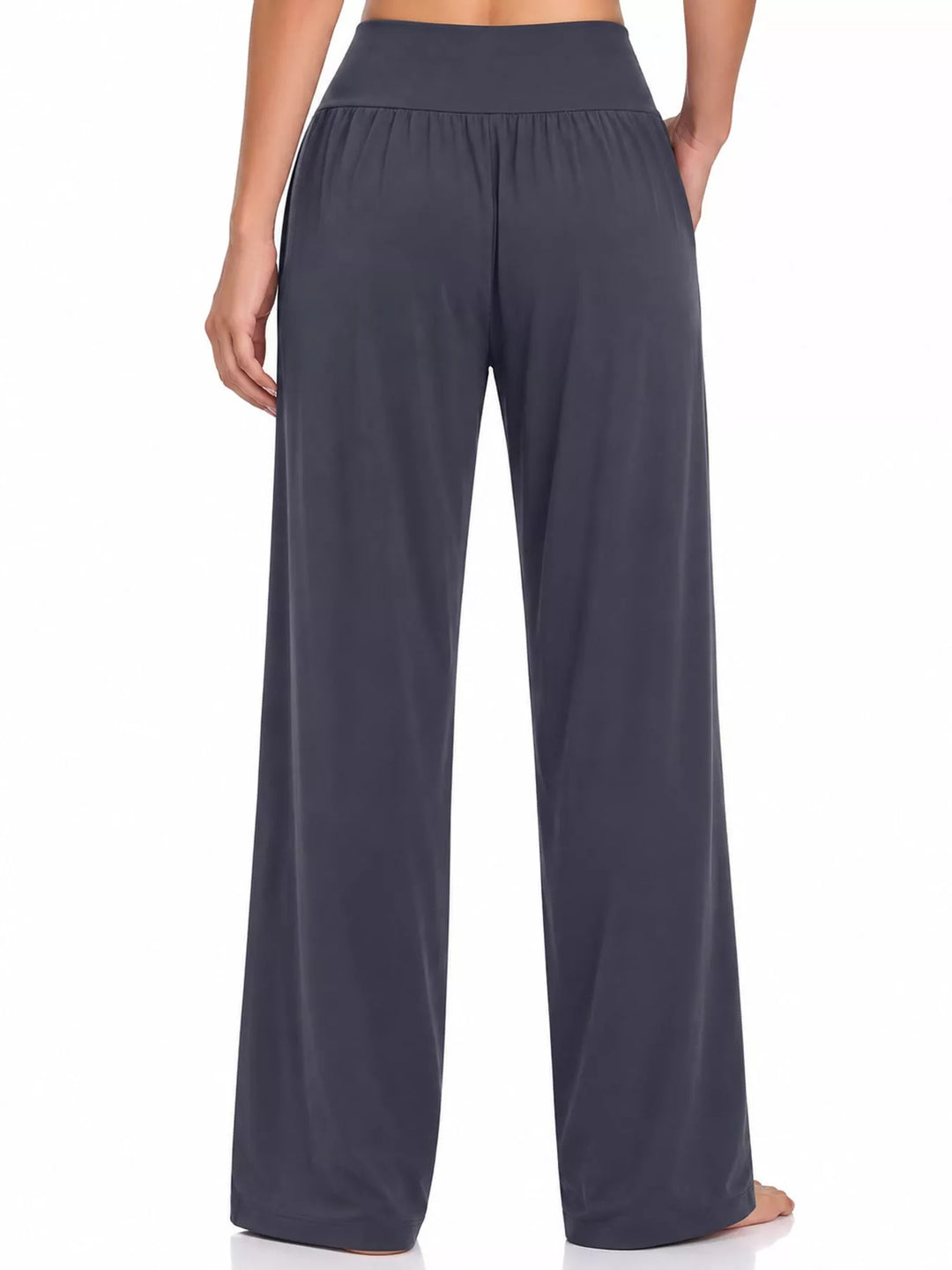 Charcoal high waisted wide leg pants, back view of the smocked waistband