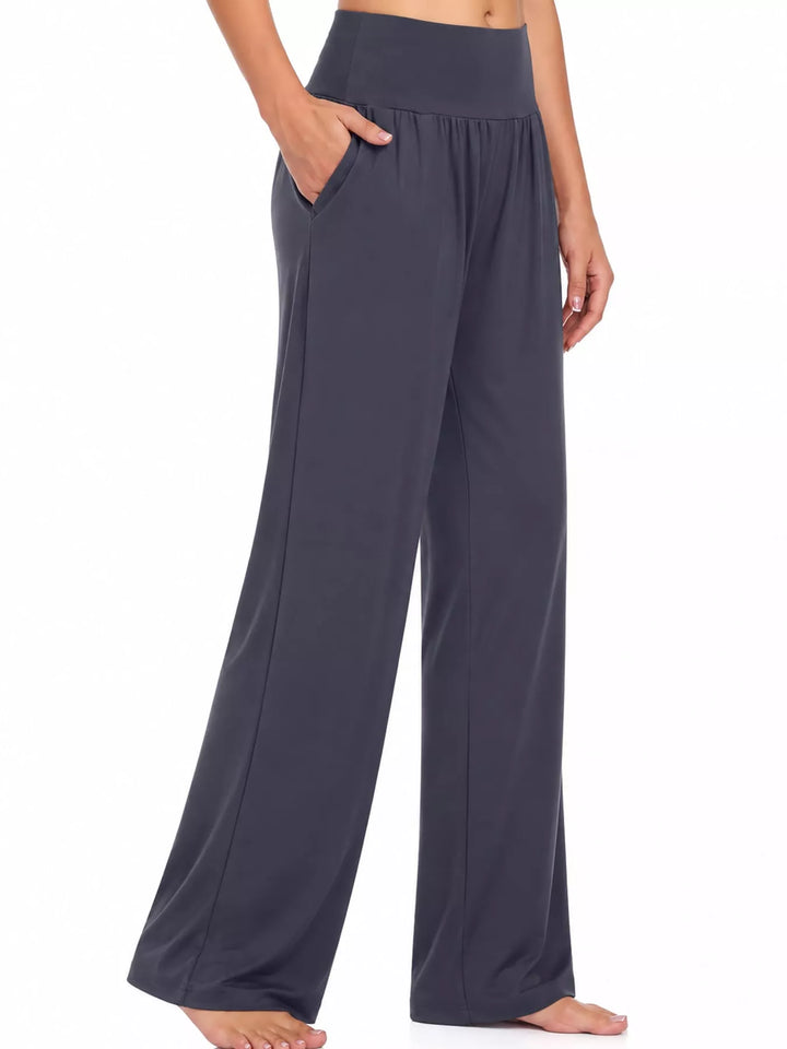 Charcoal high waisted wide leg pants, side angle showing the relaxed wide leg