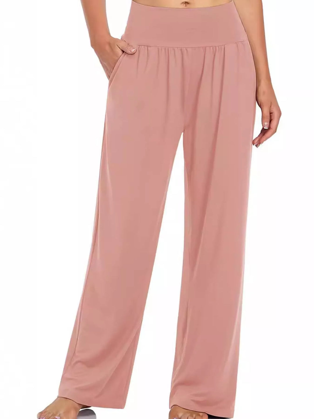 Dusty rose high waisted wide leg pants, front view with hand in pocket