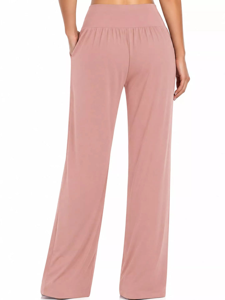 Dusty rose high waisted wide leg pants, front view with smocked waistband and pockets