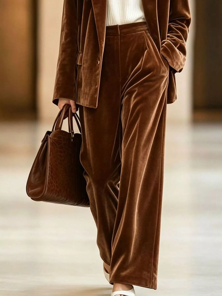 Chocolate wide leg pants and blazer set, close view of the pants and tote bag