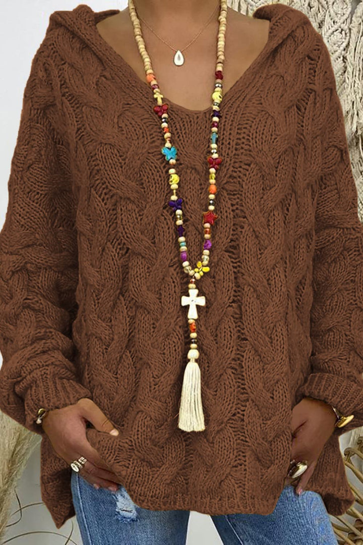 Brown cable knit hooded sweater, close-up with V neck and long beaded necklace