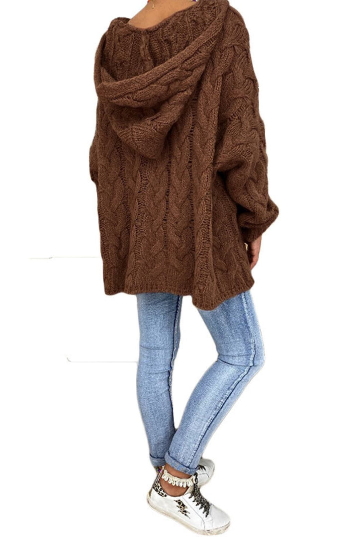 Brown hooded sweater side view with high low hem and sneakers