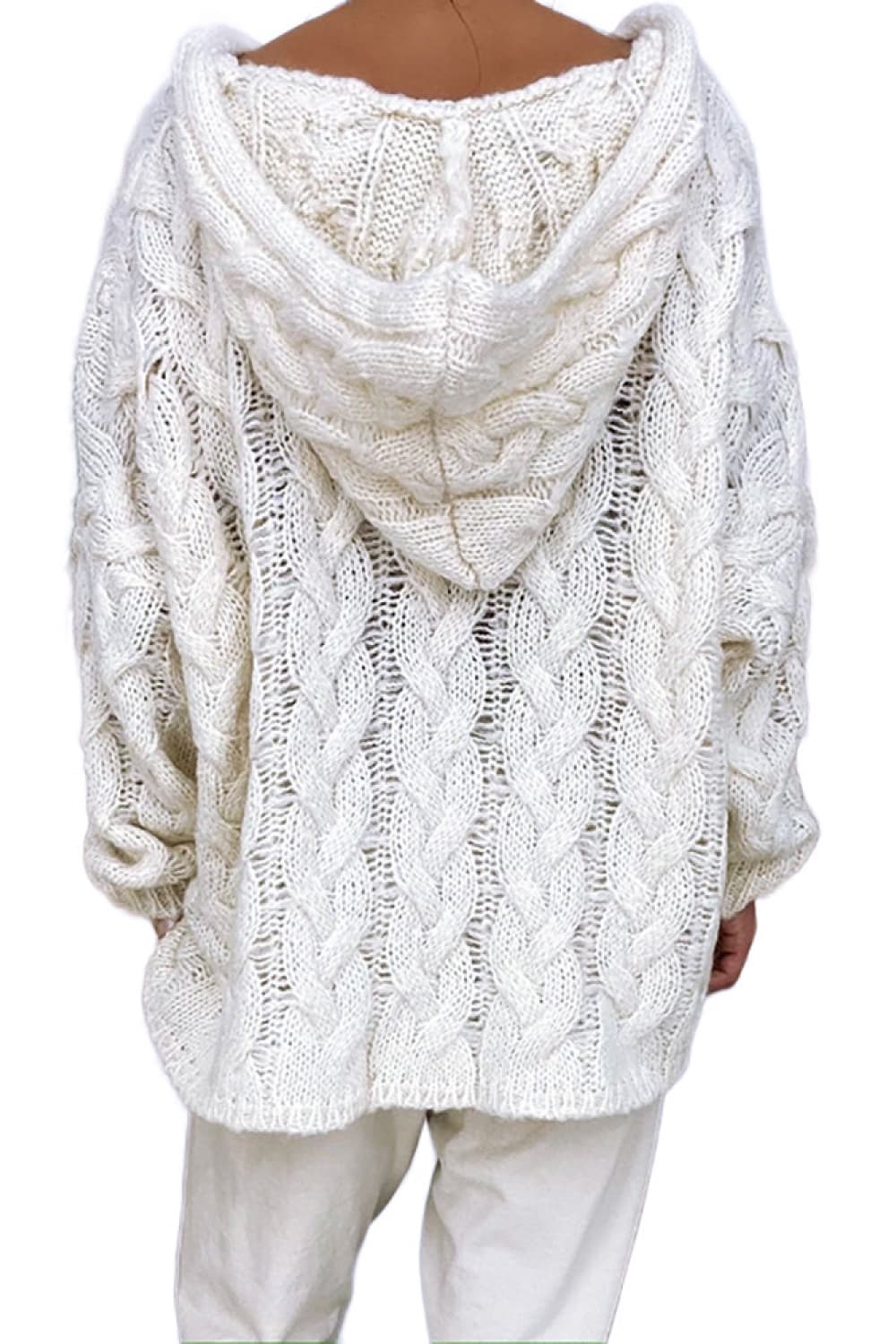 Back view of the ivory cable knit hooded sweater with relaxed hood