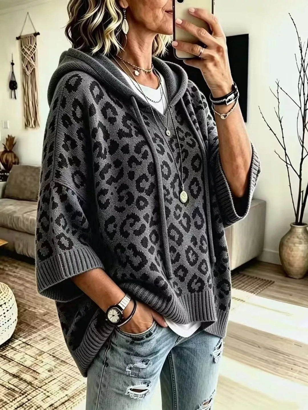 Dark gray leopard hooded sweater styled with a white tee and jeans