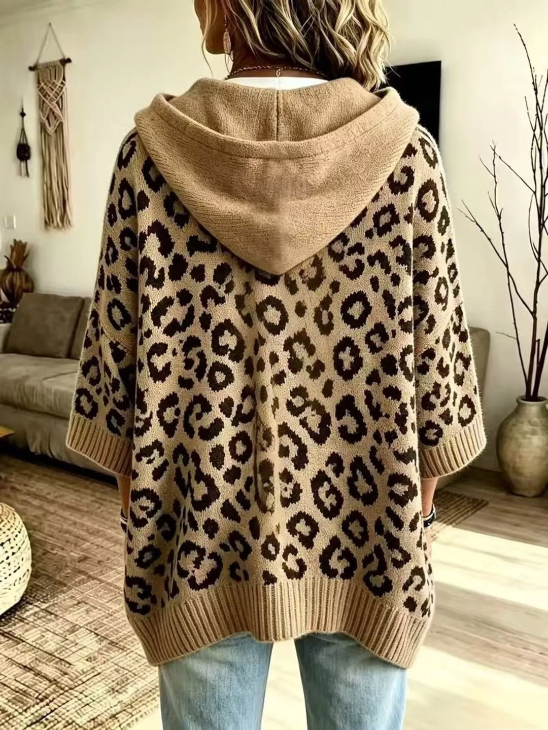 Back view of the khaki oversized hooded sweater with leopard pattern