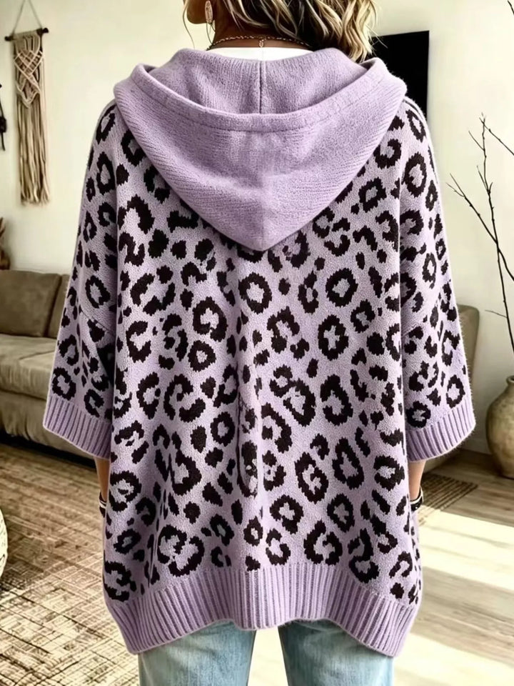 Back view of the lavender oversized hooded sweater with leopard pattern