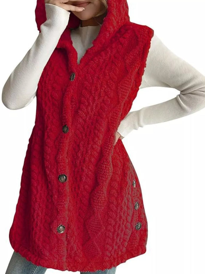 Red longline hooded vest with hand on the hip and side buttons