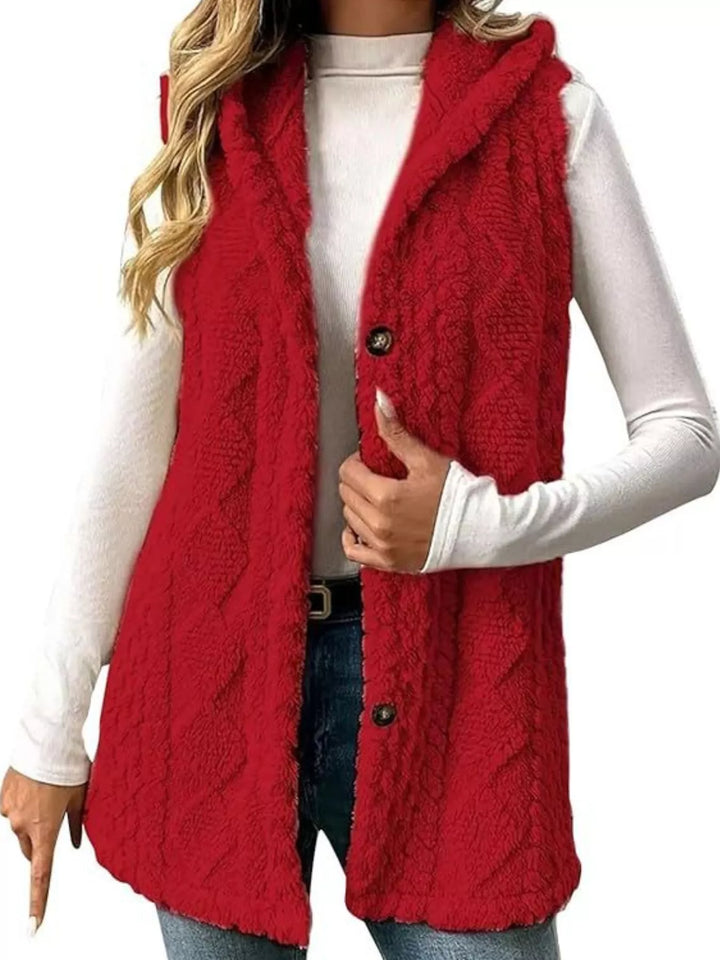 Red hooded vest in fluffy cable knit, front view with button up front