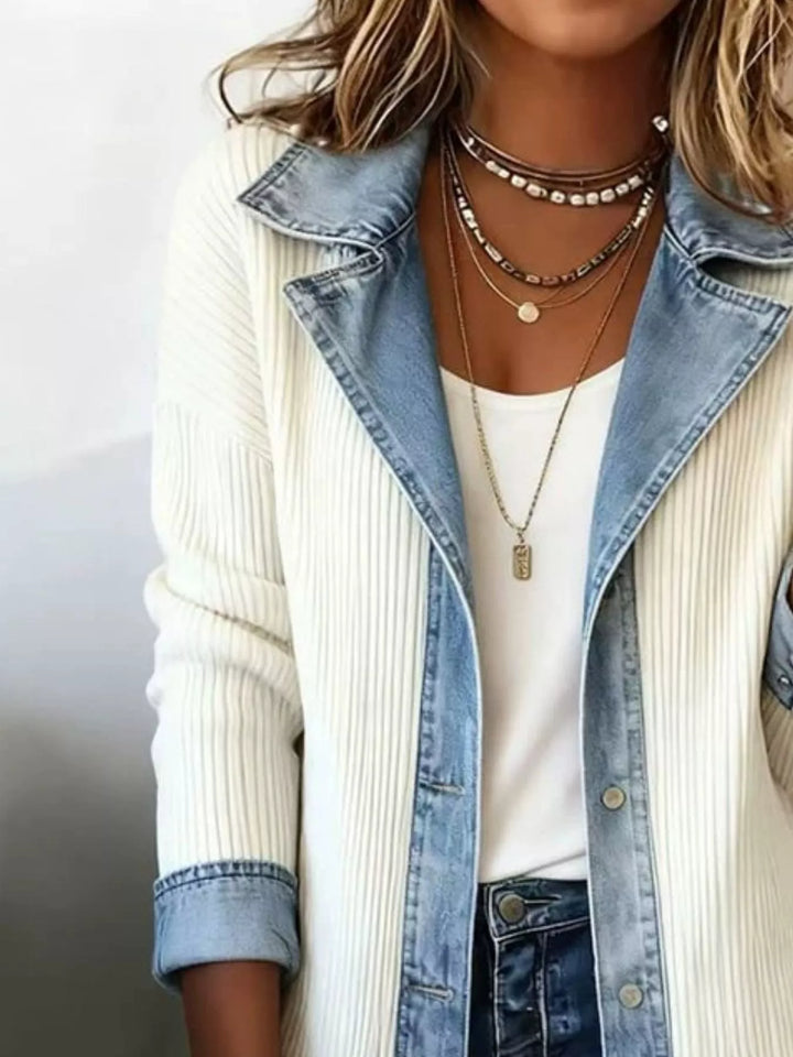 Close-up of the ivory ribbed knit jacket and denim collar