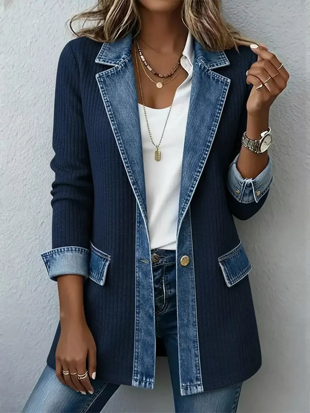 Navy open front jacket with denim lapel, button and flap pockets