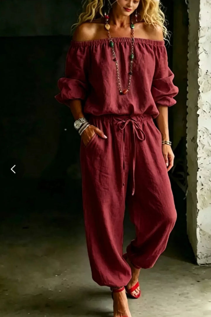 Burgundy jogger set with an off shoulder puff sleeve top and matching pants