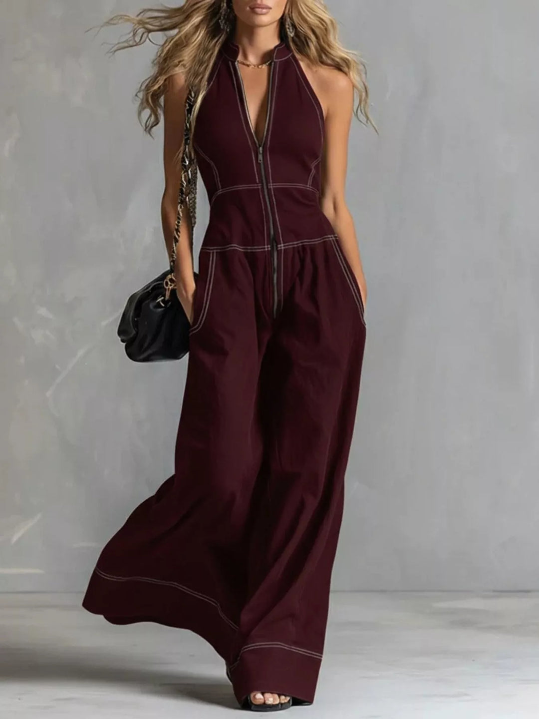 Burgundy wide leg halter jumpsuit with zip front, full-length view