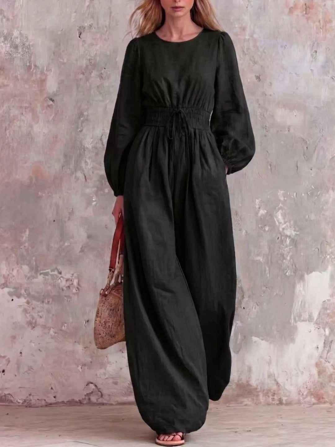 Black wide leg jumpsuit with long balloon sleeves, full length front view