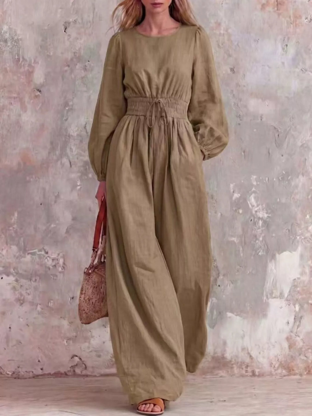 Khaki wide leg jumpsuit with long balloon sleeves, full length front view