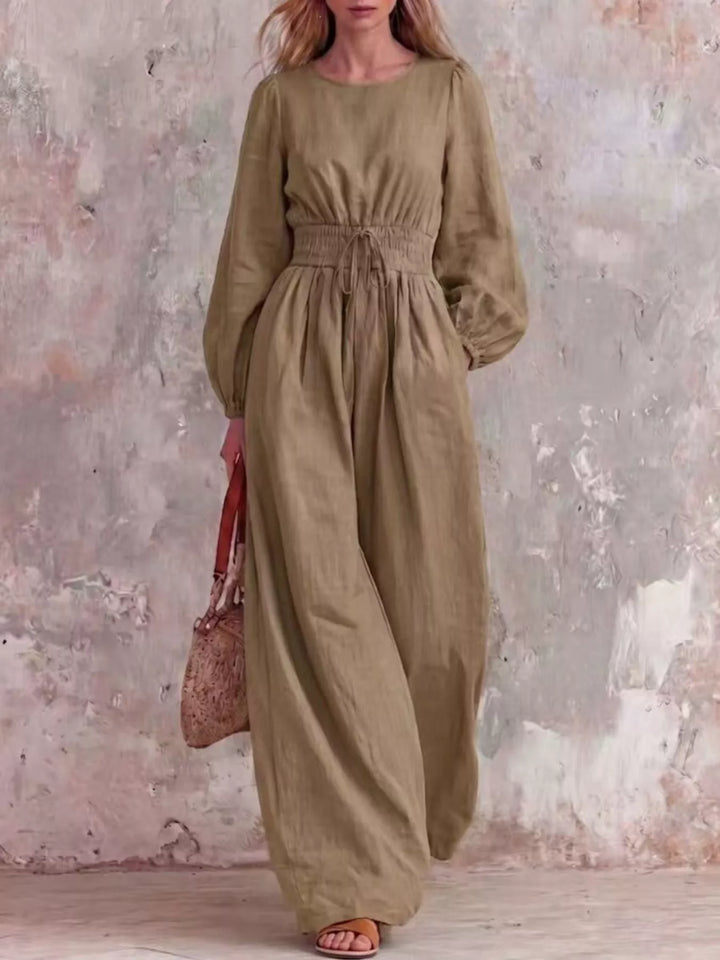 Khaki wide leg jumpsuit with long balloon sleeves, full length front view