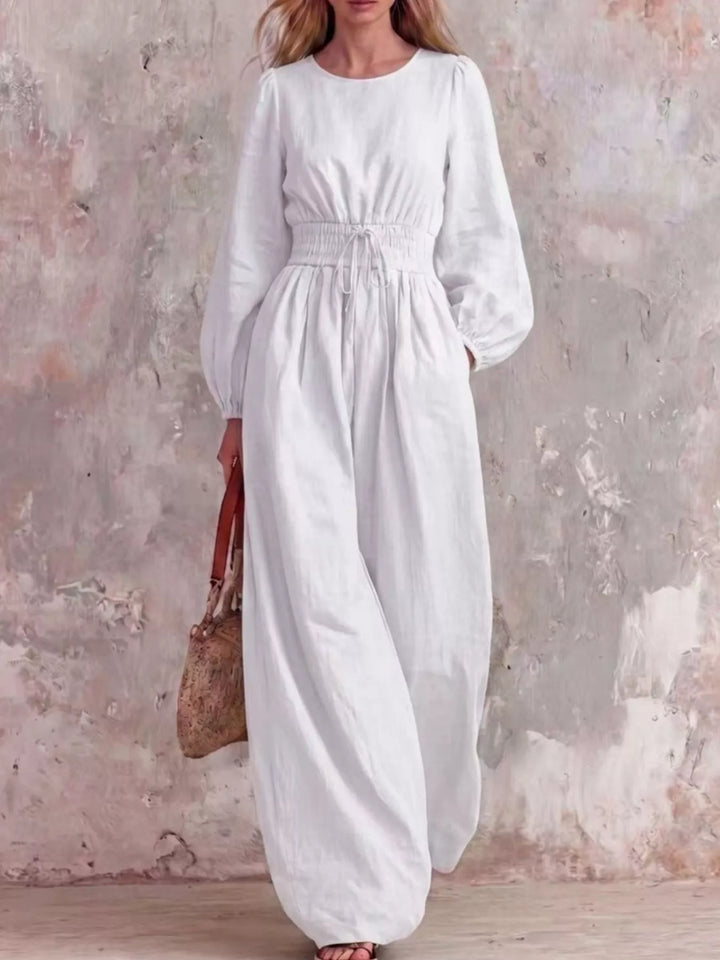 White wide leg jumpsuit with long balloon sleeves, full length front view