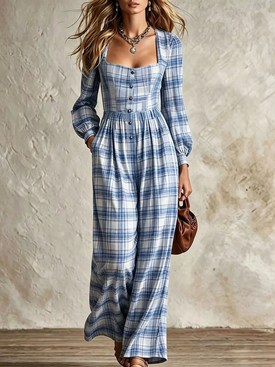 Full length light blue plaid jumpsuit with button front and gathered waist