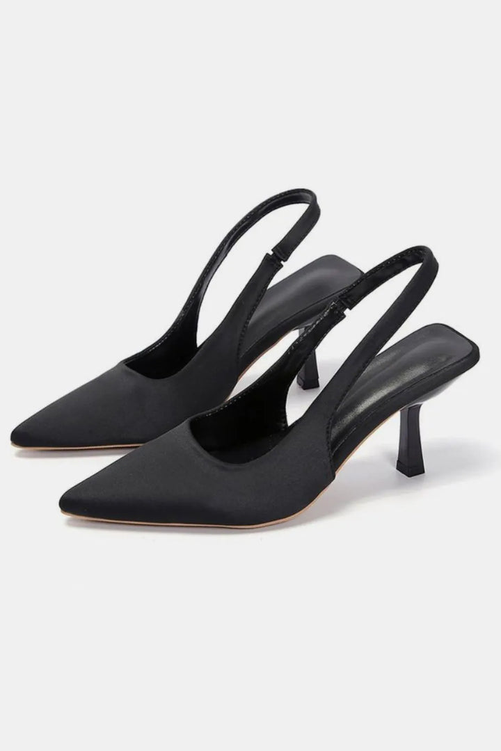 Women's kitten heels in black, pointed toe slingback pumps, pair side view