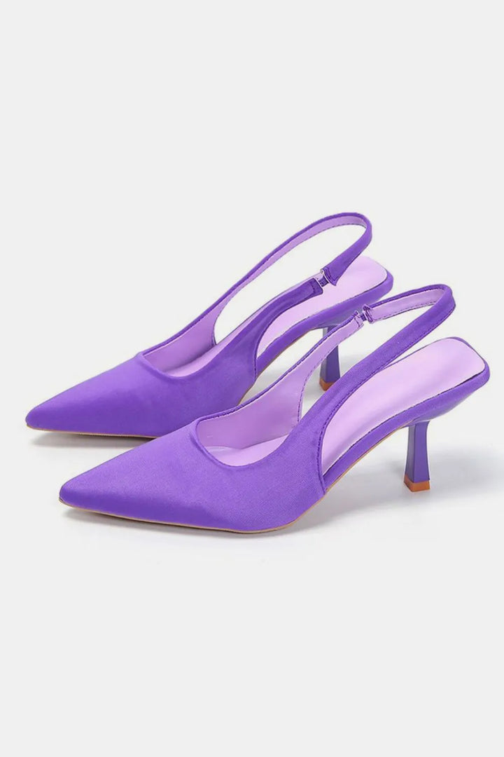 Purple slingback kitten heels with a pointed toe and slim heel