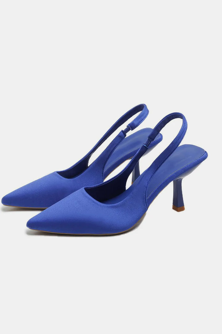Royal blue pointed toe slingback kitten heel pumps, pair view
