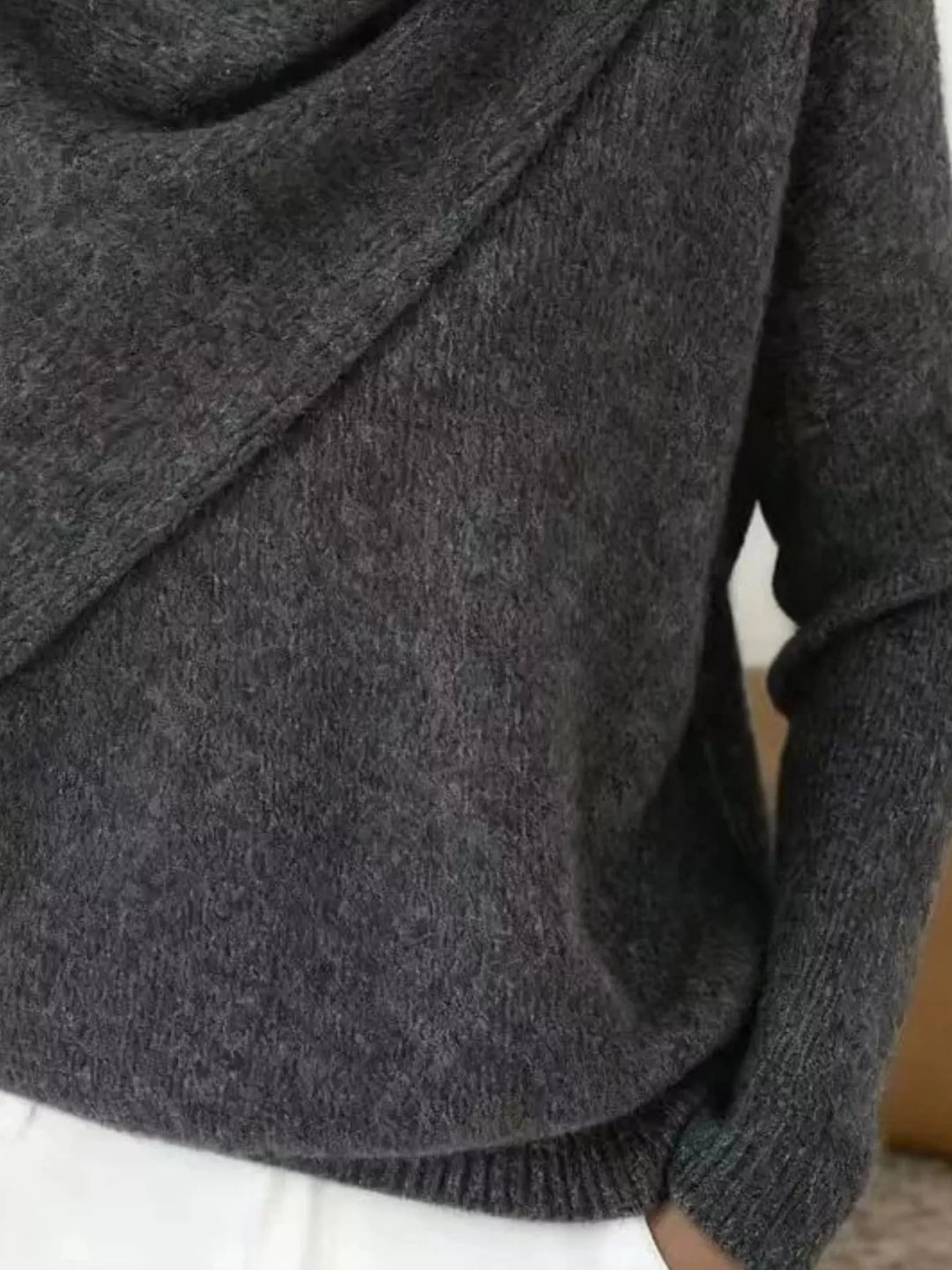 Draped diagonal cowl neck ribbed hem in gray, close-up detail 2