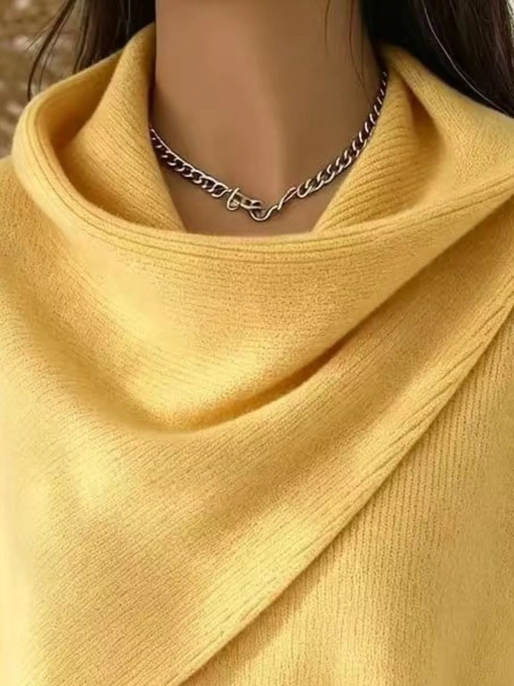 Draped diagonal cowl neck ribbed hem in yellow, close-up detail