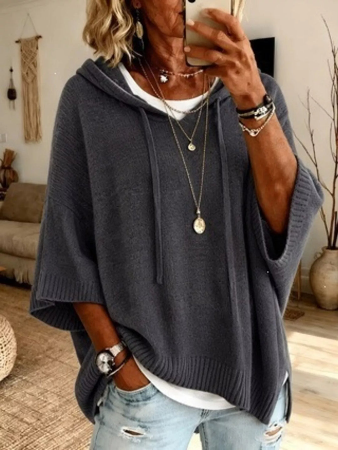 Charcoal hooded knit sweater with drawstrings, batwing sleeves and ribbed hem
