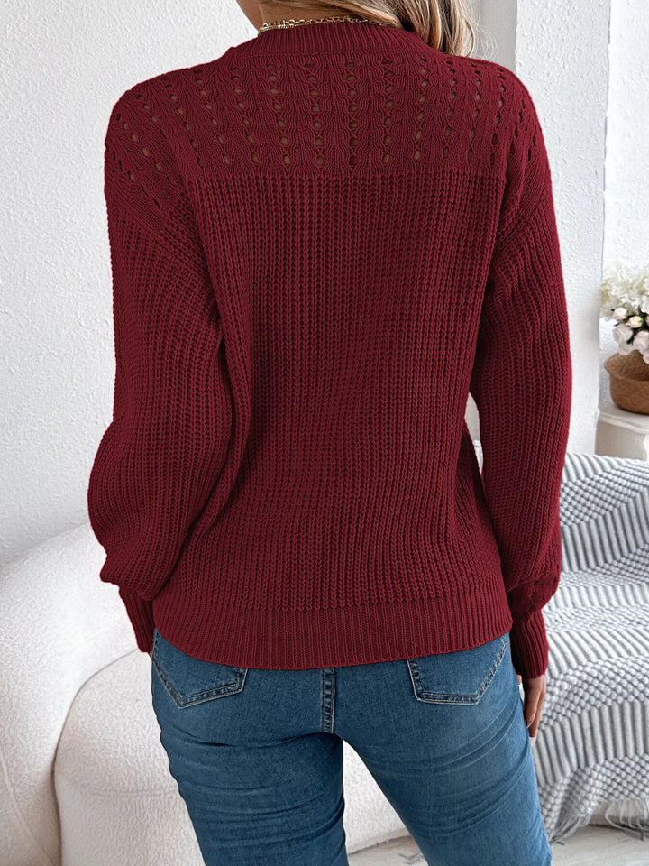 Back view of the burgundy pullover showing the openwork yoke