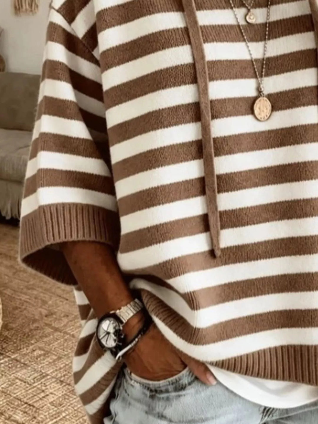 Striped hooded elbow length sleeves in dark brown, close-up detail
