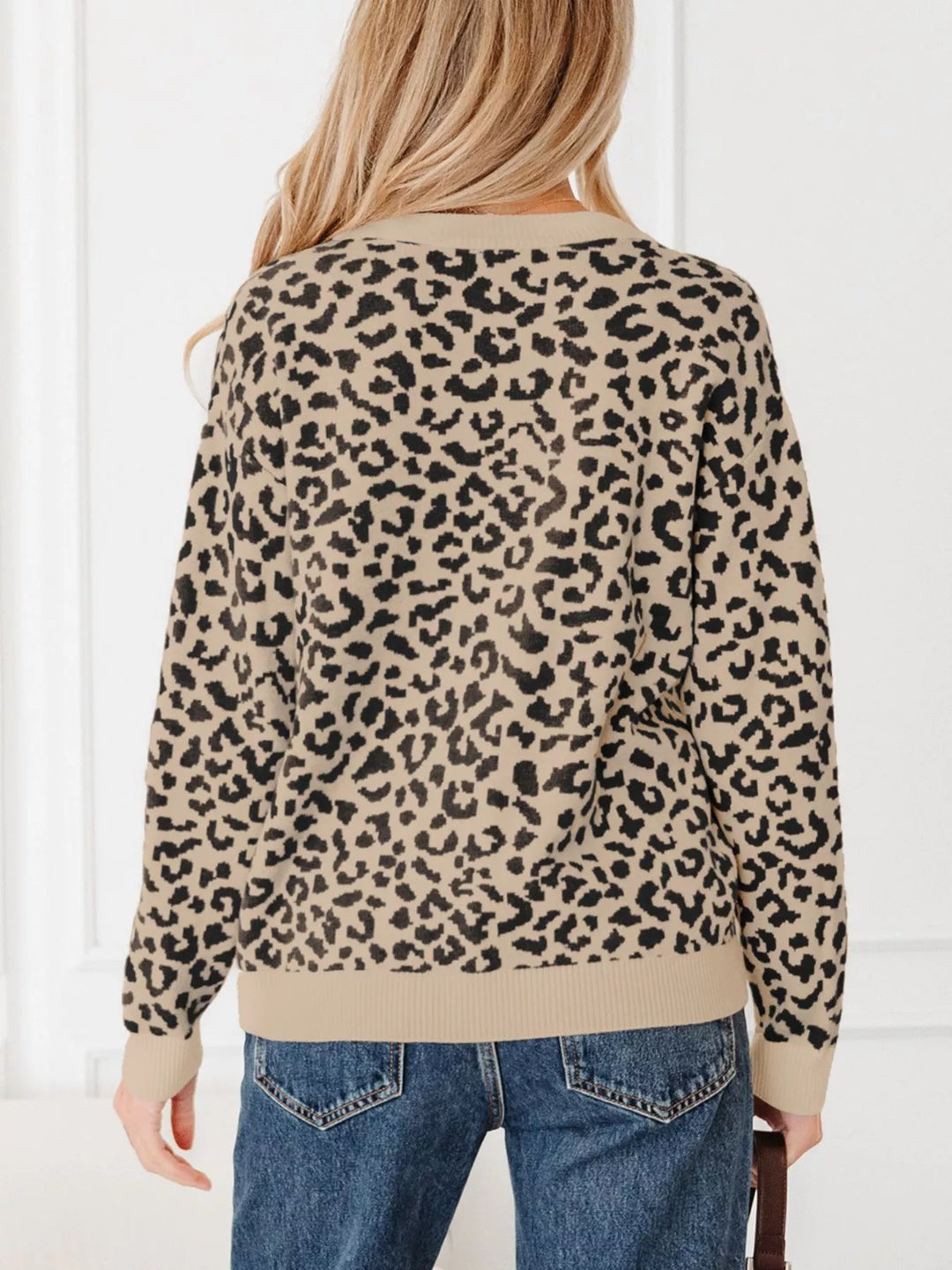 Back view of the camel leopard print cardigan with ribbed hem