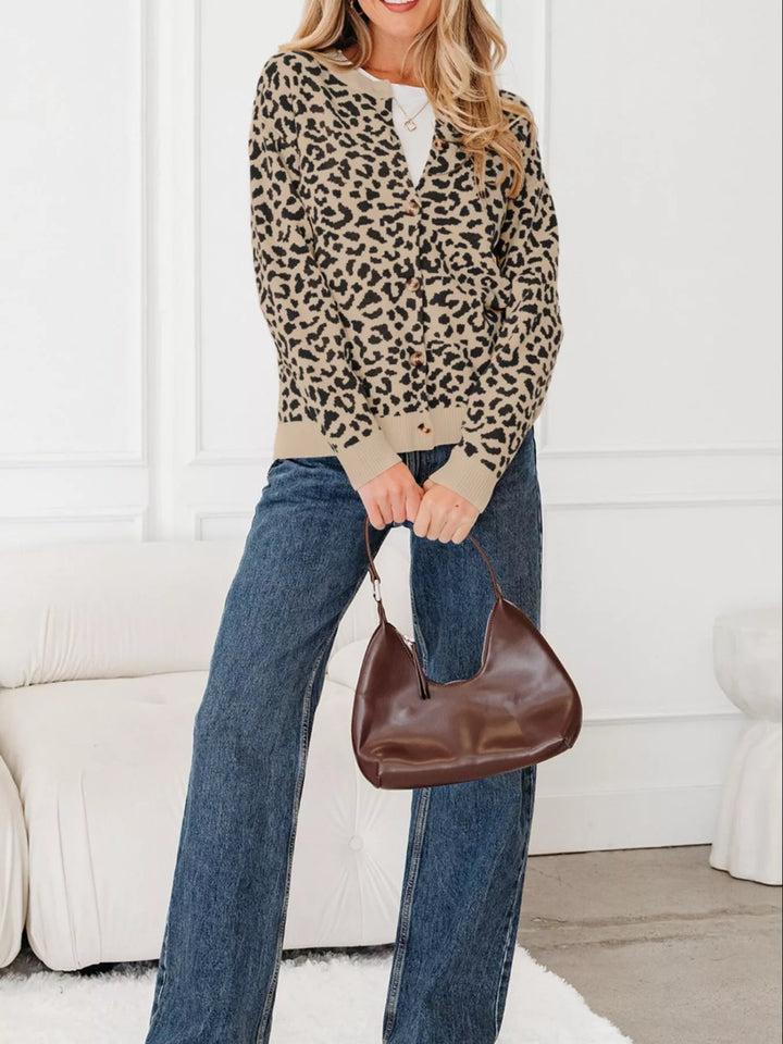 Camel leopard cardigan styled with wide leg jeans and a brown shoulder bag