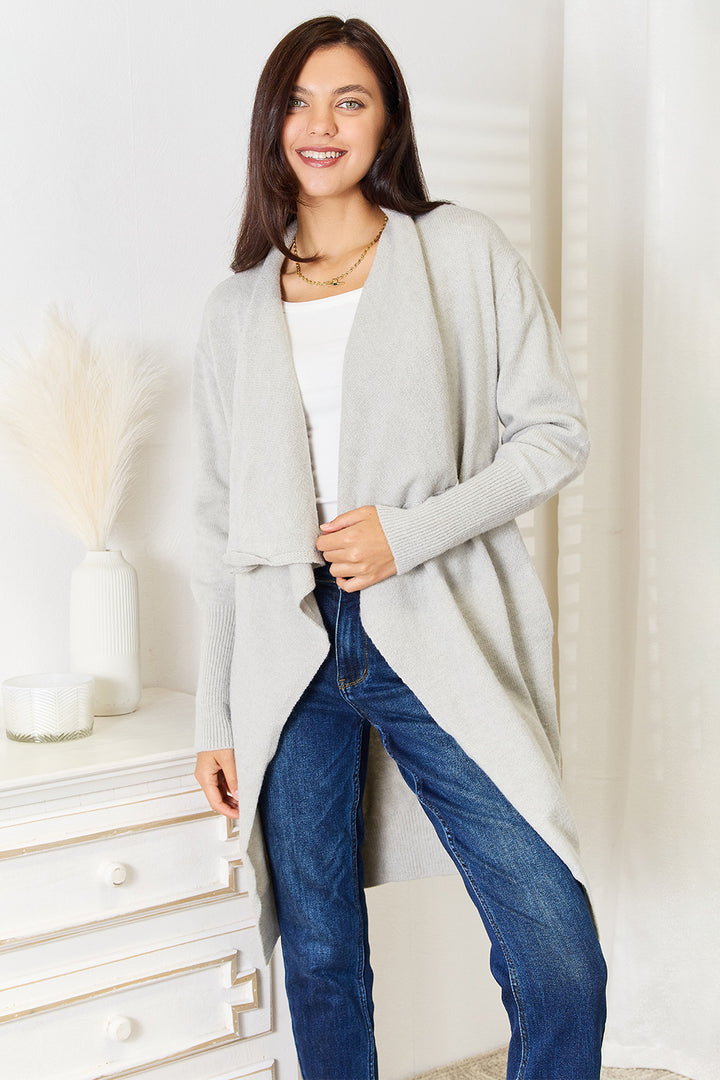 Women's long cardigan in light gray, open front duster with waterfall collar, front view