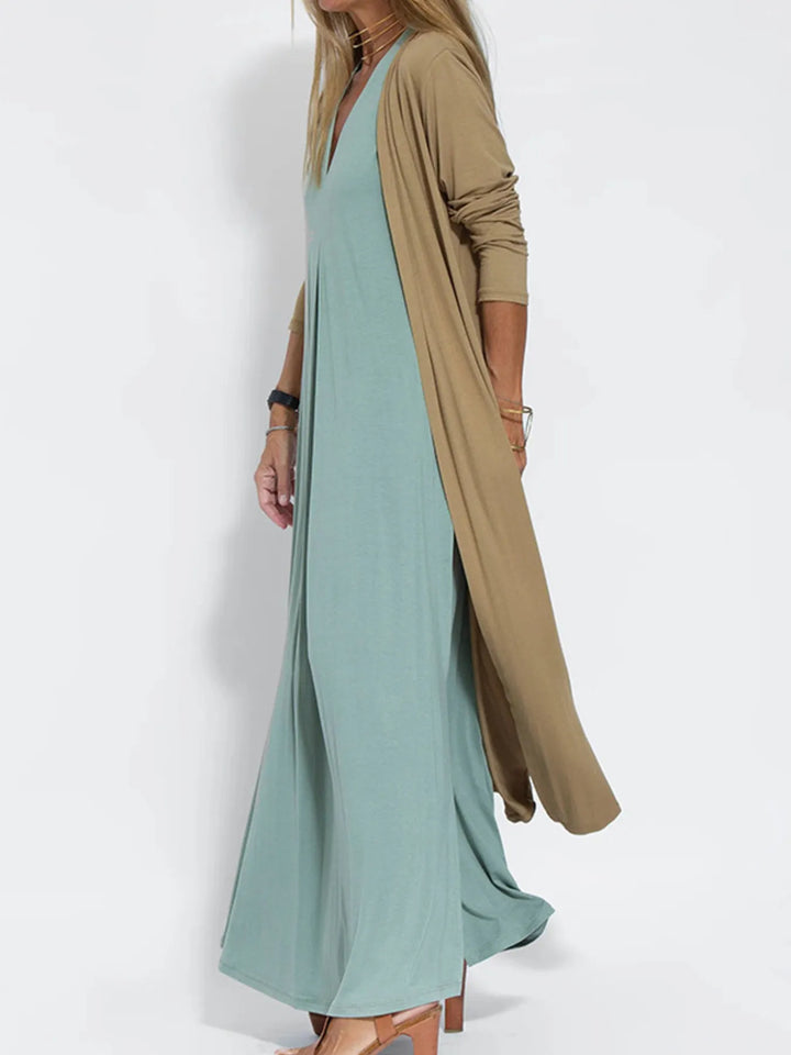 Side view of the caramel duster cardigan draping to the hem