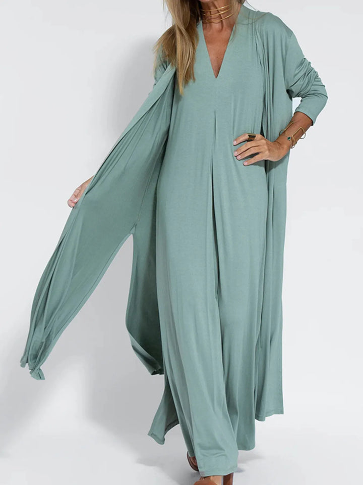 Sage green open front cardigan with a hand on the hip