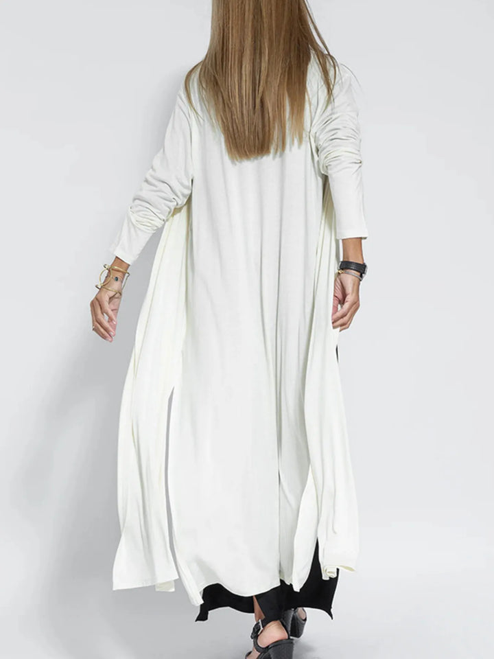Back view of the white long cardigan with side slits