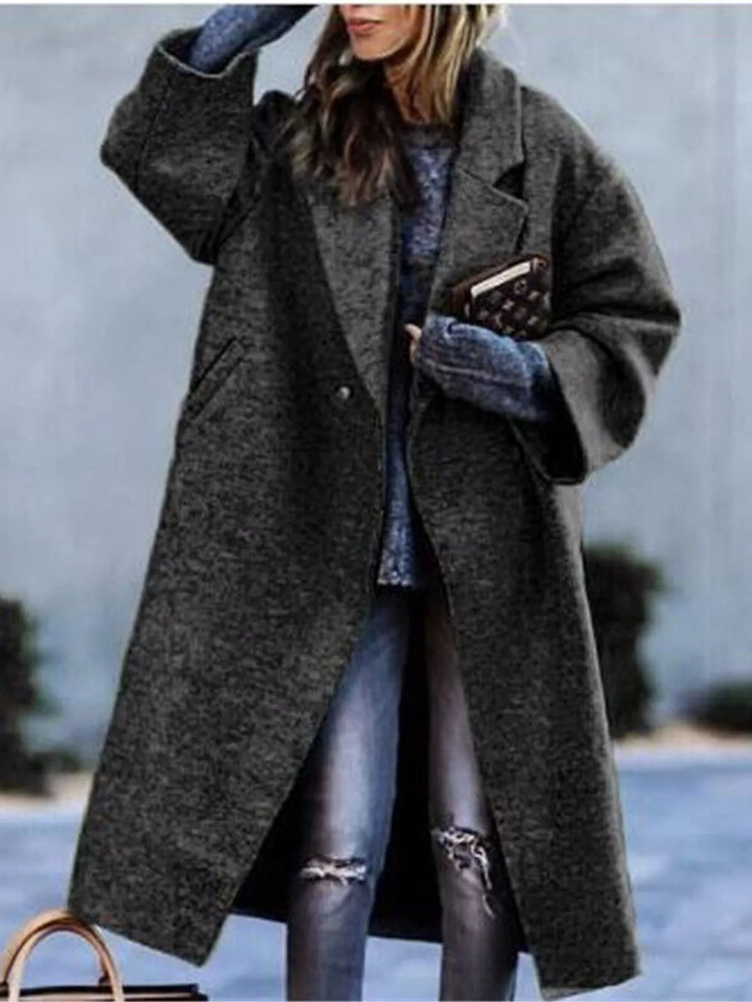Oversized lapel one button longline in black, front view